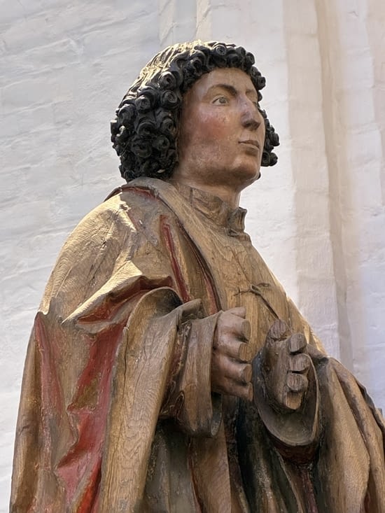 Mais le visage limpide de saint Jean nous rassure.