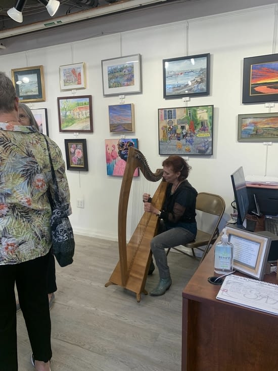 Even a harpist there