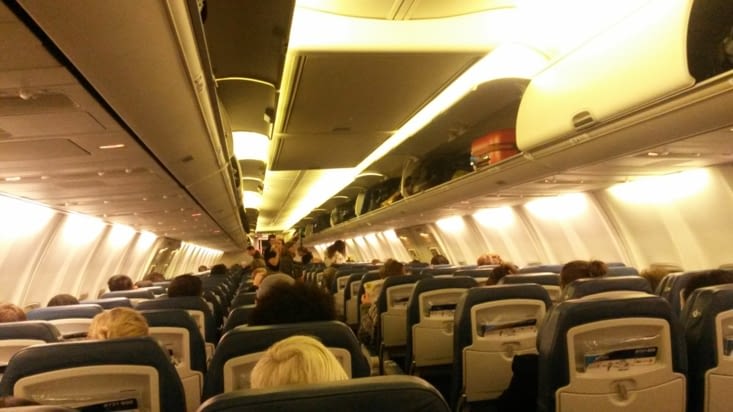 Dans l'avion pour Toronto