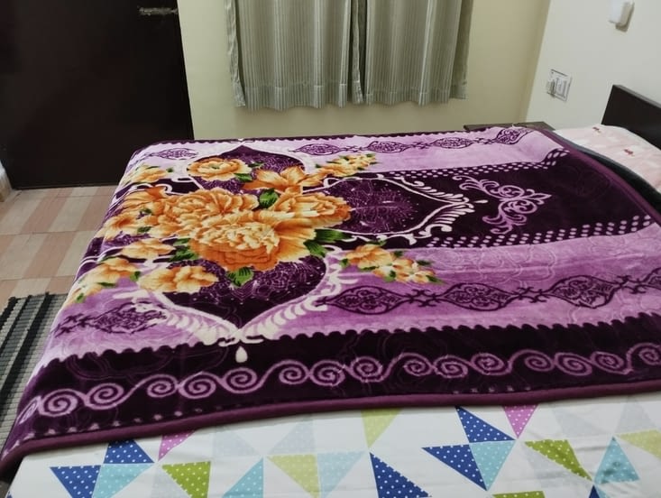 Mon lit à la couverture bariolée