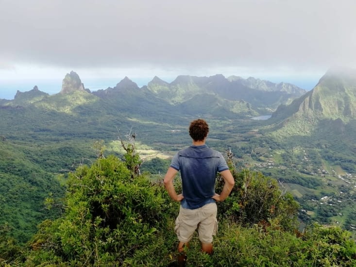 On the top, looking far behond the mountain
