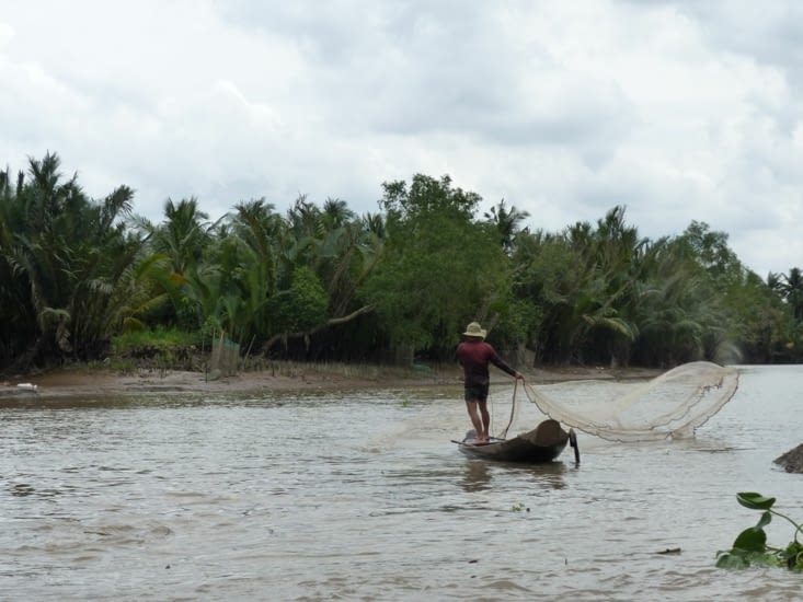Un pêcheur du Delta du Mekong