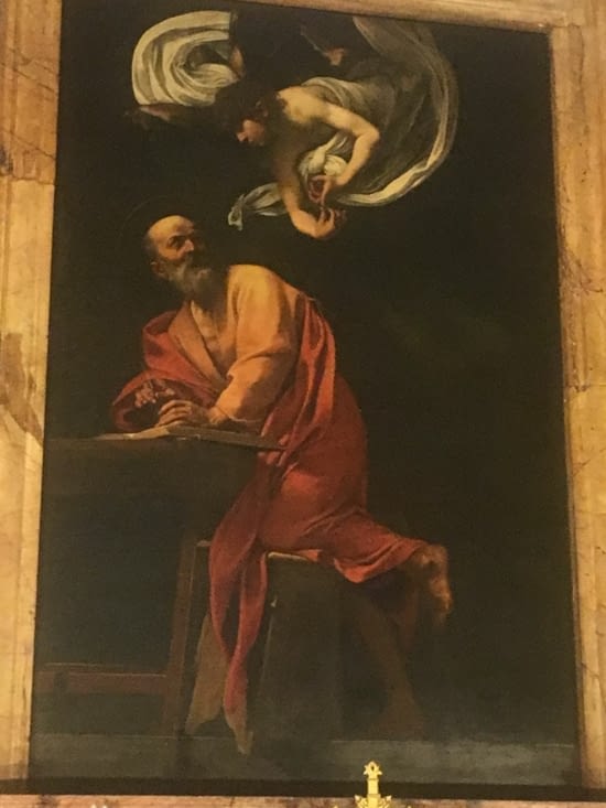 Saint Mathieu visité par un ange alors qu'il compte des sous en tant que percepteur